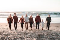 Family walking on the Beach in San Diego California for Portrait photography session
