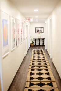 Event-friendly hallway at 1440 Health Collective with artistic touches