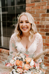 A bride smiles for her portraits in downtown Chicago.