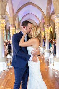 bride and groom kissing