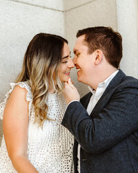 Couple almost kiss during their Union Station engagement session in DC
