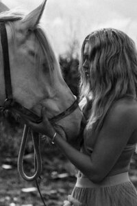 Woman connecting with horse
