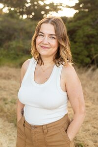 Jenni smiles outdoors