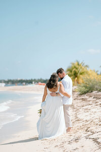 a couple at their destination cruise wedding near the ocean