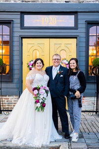 Eleanor Stenner with bride and groom at Birmingham wedding 