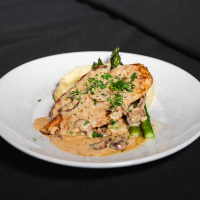 chicken marsala with crimini mushrooms and marsala cream Max Dales Steak and Chop House Restaurant