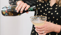 pouring champagne to celebrate email marketing success