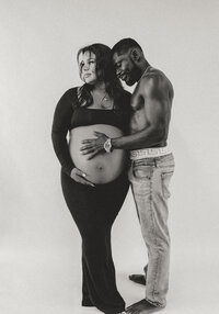 Photo of a couple in Black and white during their studio maternity session in Bloomington Indiana.