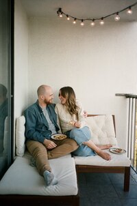35mm film photographer at home lifestyle couple session on their patio in kelowna