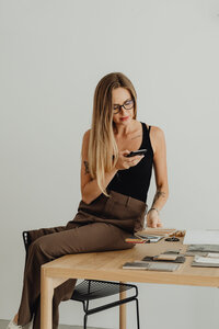 kaboompics_young-architect-woman-portrait-in-her-studio-27964