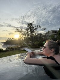 Mary Beth Lynn, Systems and Assistants Coach for Travel Advisors, poolside in the Philippines