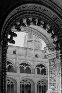 Ornate European stone archway framing cathedral architecture — representing the historic beauty and cultural depth behind Somewhere Travel Co.’s luxury travel experiences.
