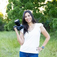 Rox Chapman with camera smiling