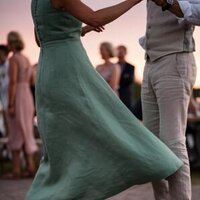 A couple dancing together outdoors at Florida sunset, symbolizing renewed closeness, emotional healing, and joy after completing online couples therapy with Relationship Experts.