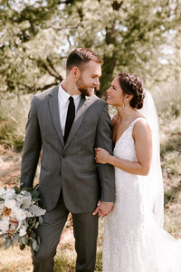 Bride and groom walk up memorial steps at their DC wedding