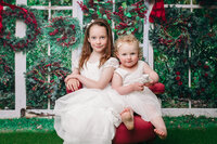 children posing for a christmas santa photo in hobart 2021 by Lauren Vanier Photography