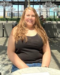 Before picture of women with brown hair and black tank top