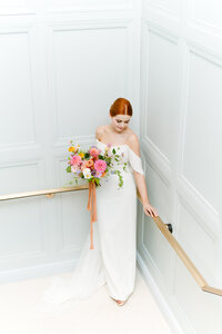 bride at hotel with bouquet