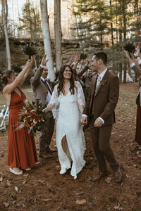 Wedding party celebrates newlyweds