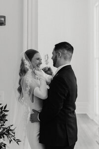 Chicago IL, bride and groom sitting in old house