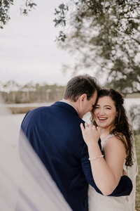 couple has wedding photographer at Heron Pointe in Orange Beach