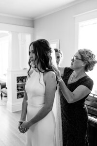 bride and mother getting ready