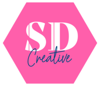 Striped Dog Creative pink and white hexagonal logo