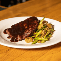 ribeye steak with red wine demi Stanwood Grill Restaurant