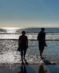 Couple walking on the beach