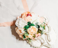 White shoes with peach bouquet