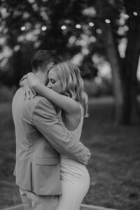 man gives woman piggy back ride