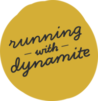 Running With Dynamite secondary logo with dark grey type on gold hand-drawn dot.