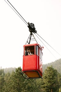Unique Colorado elopement in Aspen with bride and groom riding the gondola 