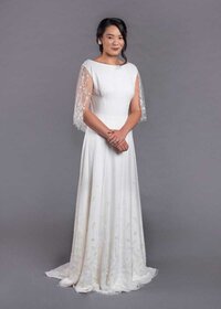 traditional a line wedding dress with beaded bridal cape
