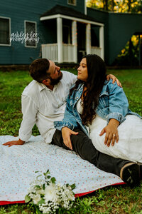 elopement couple sitting on blanket