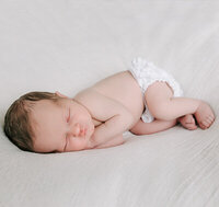 newborn baby sleeping in home in raleigh
