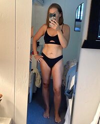 After picture of women after committing to a workout routine with Fit by Coach Kel