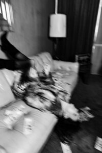 Black and white, blurry brand photo of Juliet Trnka