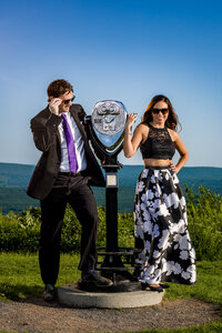 A wonderful family mini session portrait captured on the historic Phoenixville bridge, celebrating moments together.