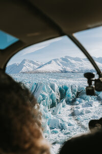 helicopter view looking down over knik glacier during an alaska elopement