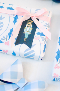 Christmas gift wrapped with nutcracker paper