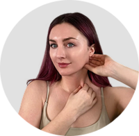 Women doing lymphatic drainage facial exercises with her hands 