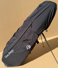 Water resistant golf bag cover by Over Armor Golf standing on golf course