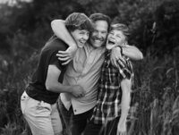 Fun Family photos of dad with his sons Adam Hommerding Photography