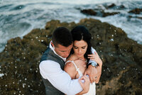 Luxury Wedding Portraits by Moving Mountains Photography in NC - Photo of a couple on the beach on their wedding day.