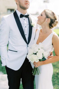 Bride and groom walk up memorial steps at their DC wedding