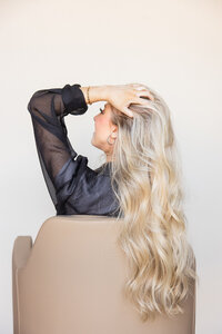 Stylist finishing a voluminous blowout at Echelon Salon Santa Clarita