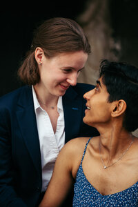 Two girls looking at each other during a couple photoshoot in Venice