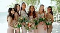 fallback shared on Invalid Date | The bride holds her bouquet surrounded by her bridesmaids in pink dresses.