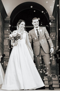 bride and groom embracing